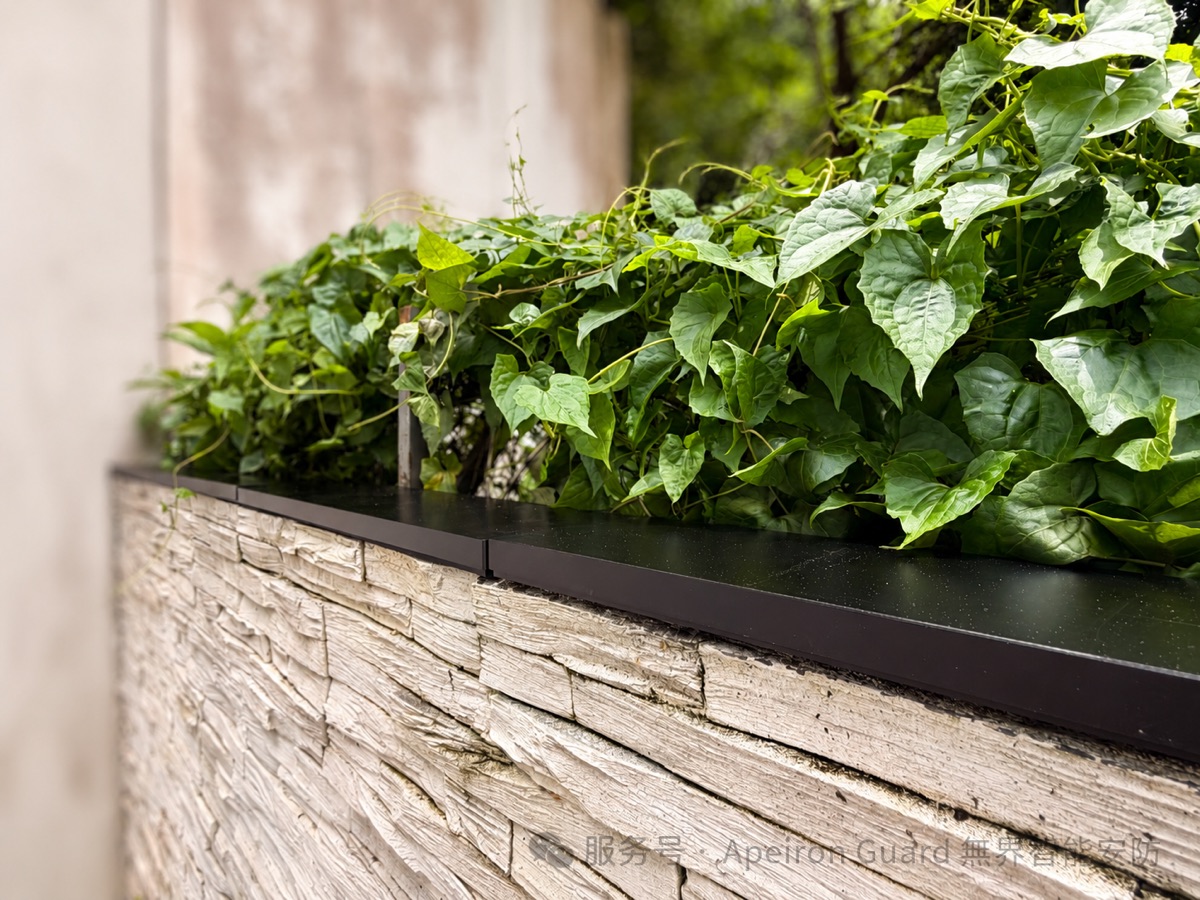 Completed low-profile battery-free sensors following a stone-clad residential boundary wall