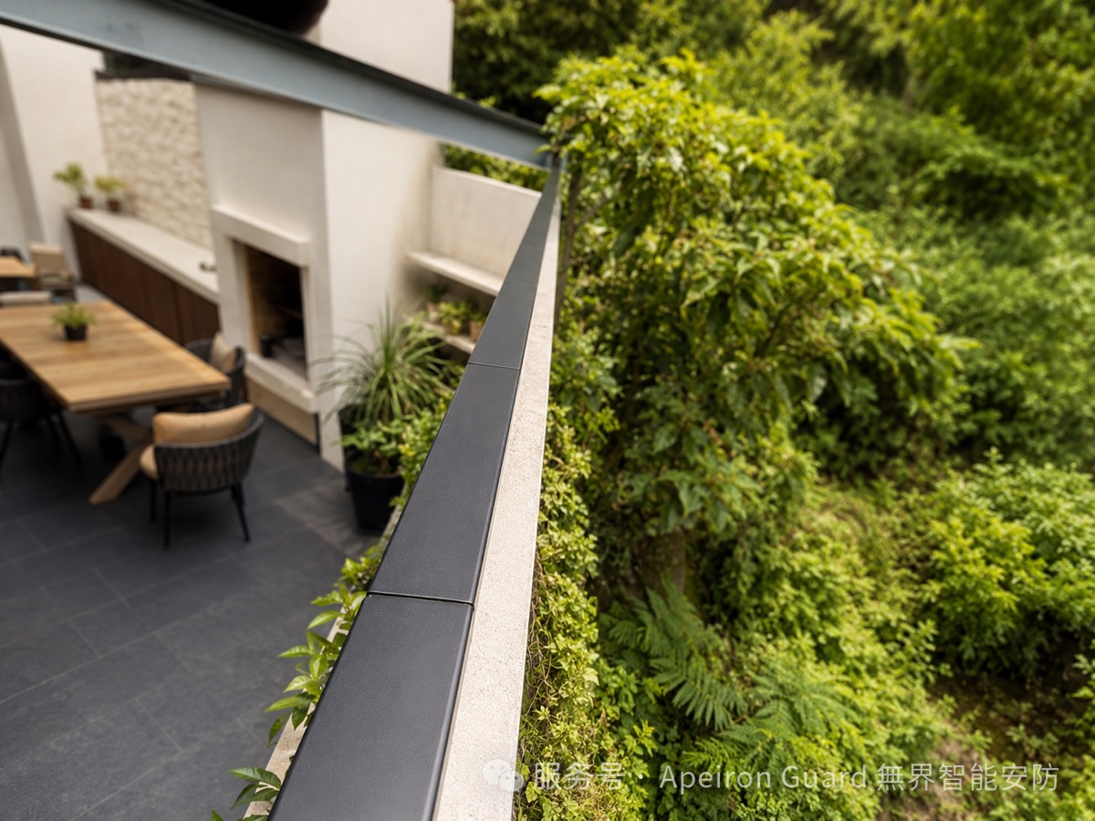 Apeiron Guard battery-free wall-top sensors installed along a completed residential perimeter